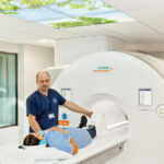 A lady is being diagnosed in the latest MRI scan