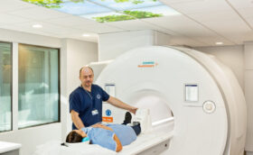 A lady is being diagnosed in the latest MRI scan