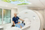 A lady is being diagnosed in the latest MRI scan