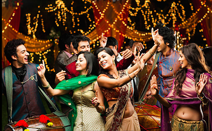 A Gorgeous Indian Wedding Guests Dancing In Sangeet.