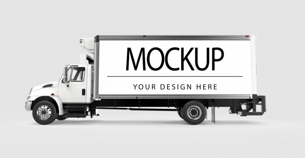 A White Colored Mobile Billboard Truck Moving Through The City That Representing The Mockup For The Advertisement.