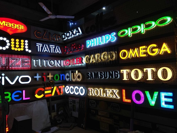 LED Sign Boards Of Various Brand Names On Display.